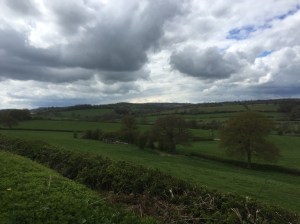 Pedalling through the Derbyshire countryside, dark clouds looming