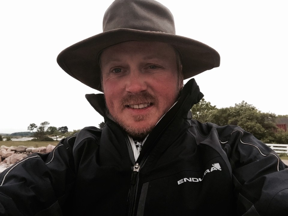 Hat makes an appearance, good for keeping the rain off