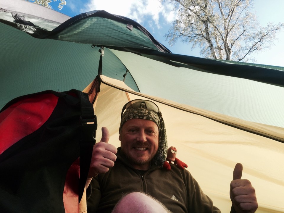 Double thumbs up after a hard day's ride