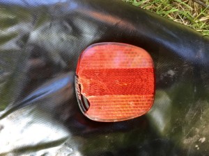 Rear reflector falls off and is run over
