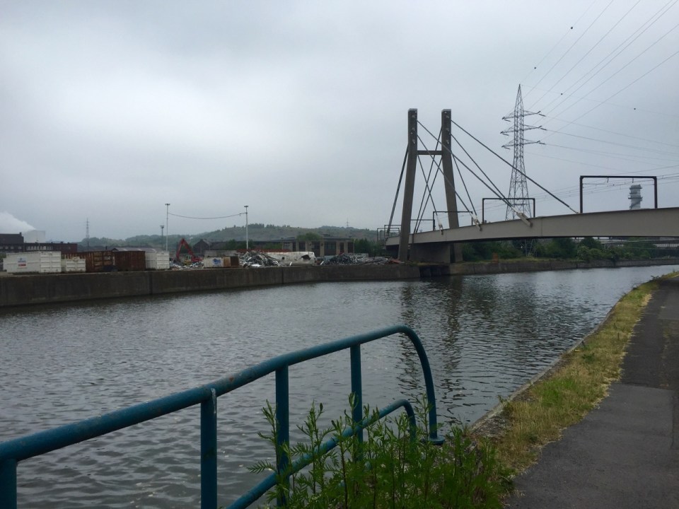 Canal towpath through industrial outskirts of Charleroi