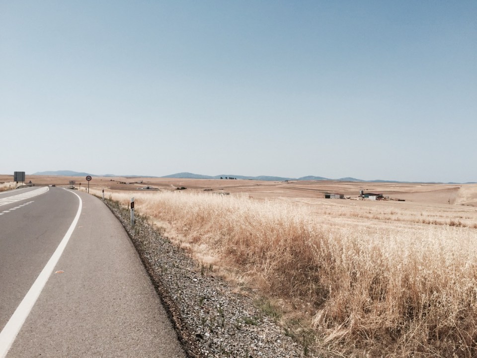 Back on the road - worrying hills in distance