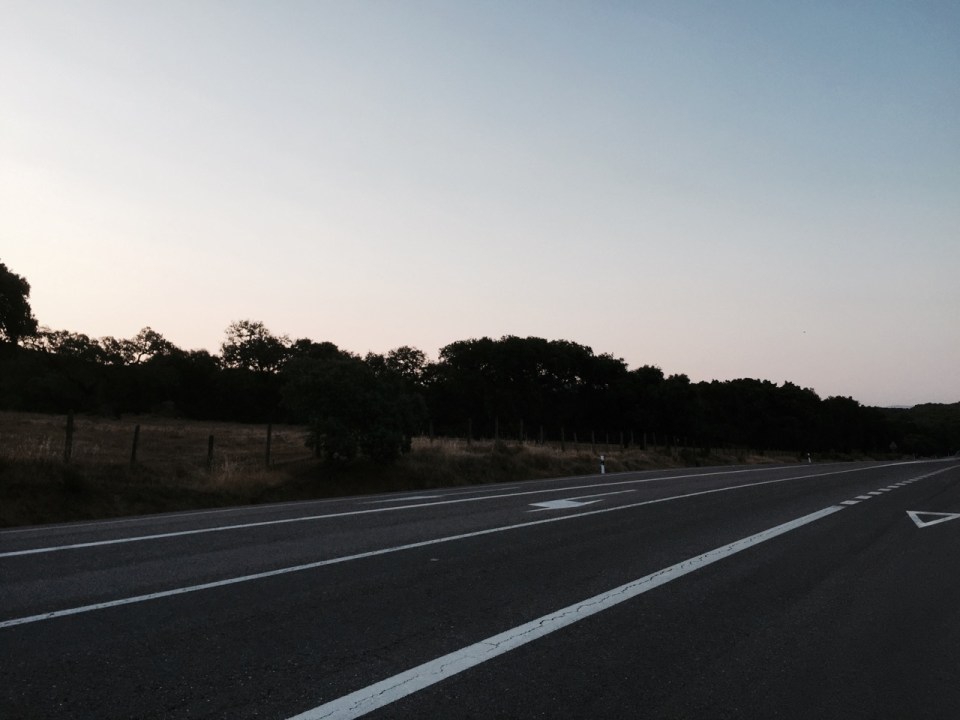 Not many other people around; sub about to rise over mountain