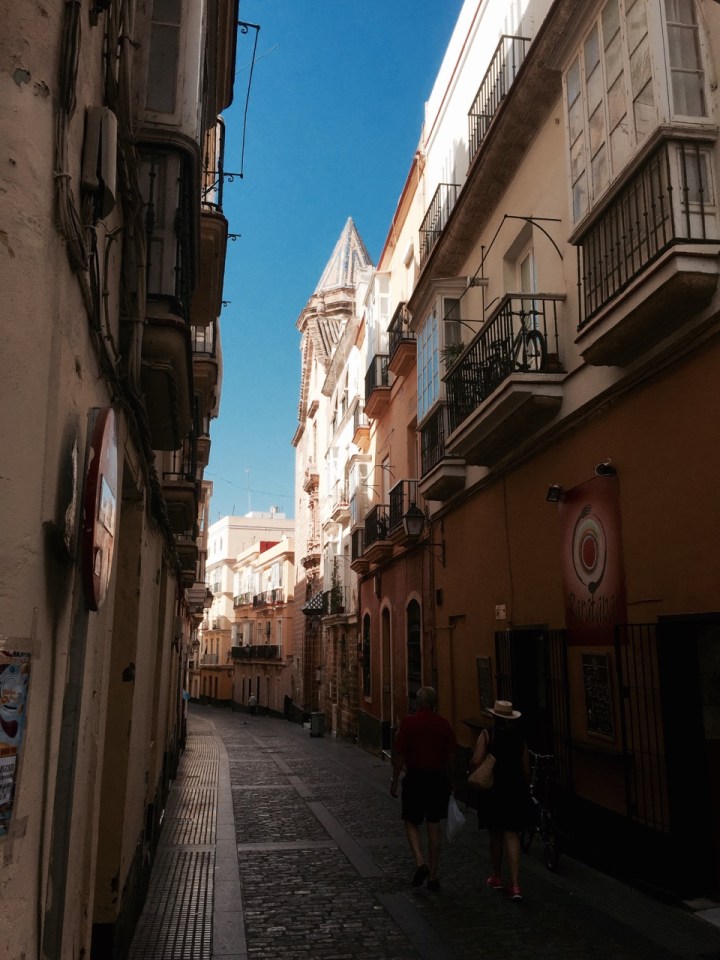 Narrow street in Cadiz, shade and sunlight