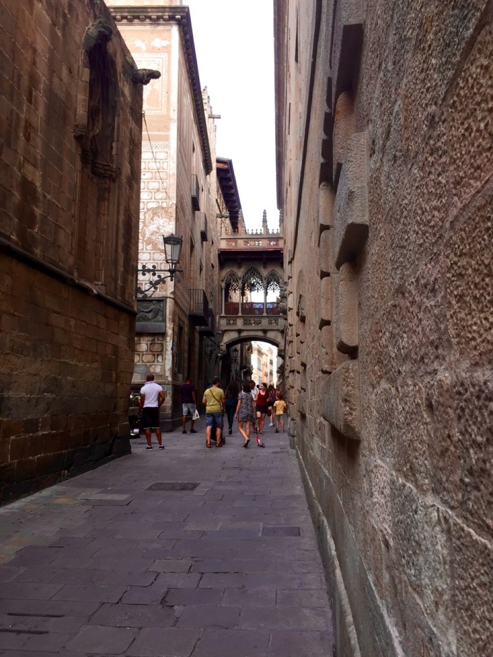 Street next to cathedral with famous Gothic arch