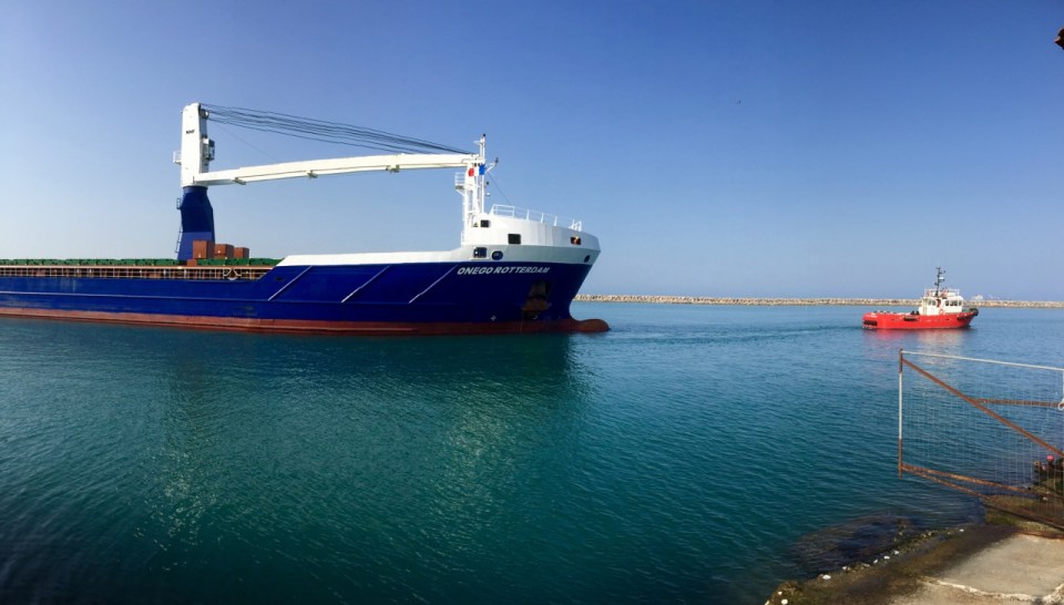 Onego Rotterdam being towed out to sea