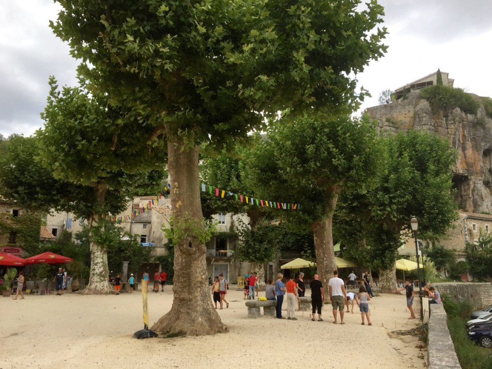 Labeaume - square by the river, petanque games in progress
