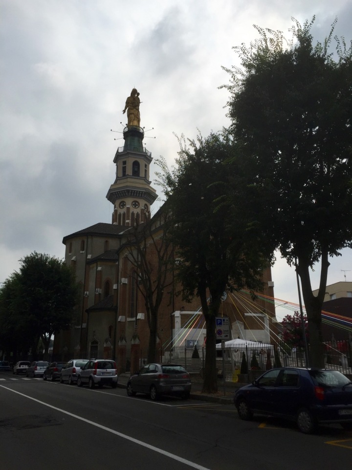 Made it Tortona, gold statue on top of this church seen from afar