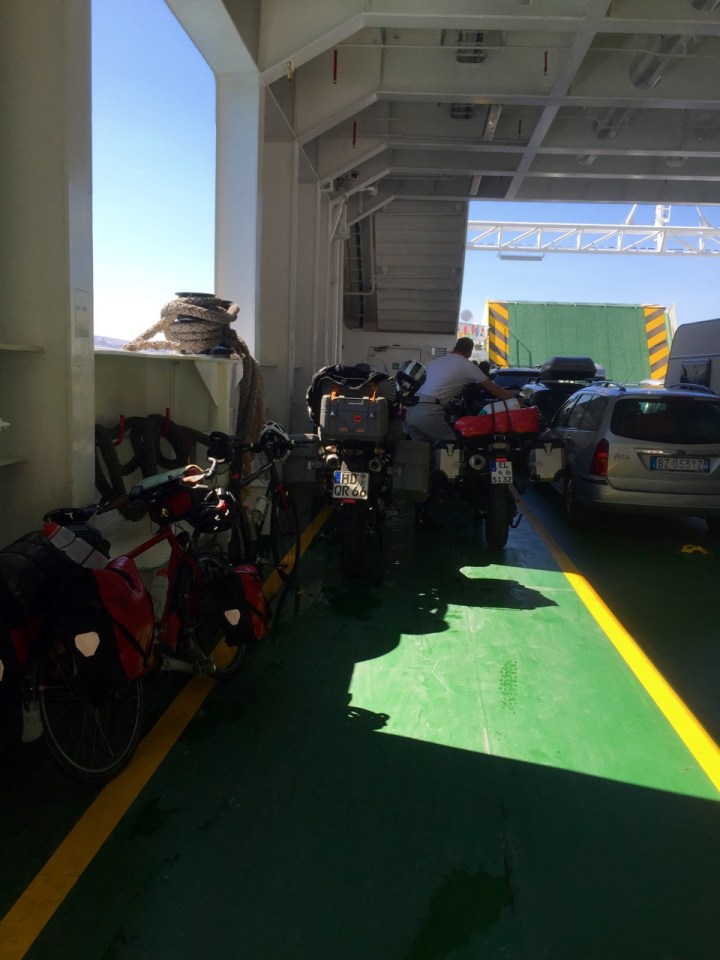 Smaug on board; keeping motorbikes company