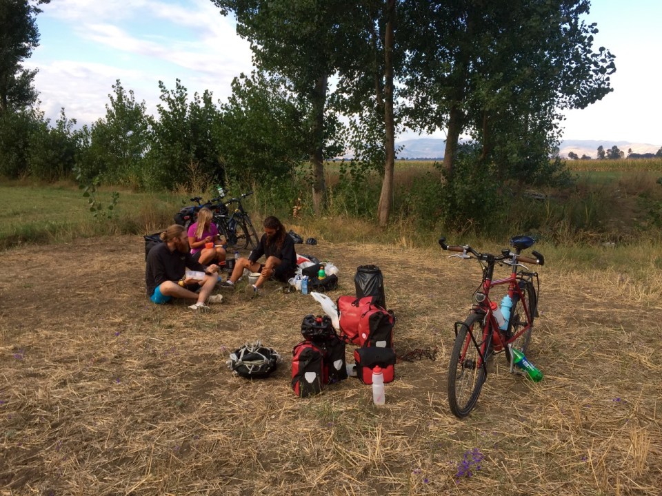 Morning pack up post last night in Albania - note 7up bottle bike stand