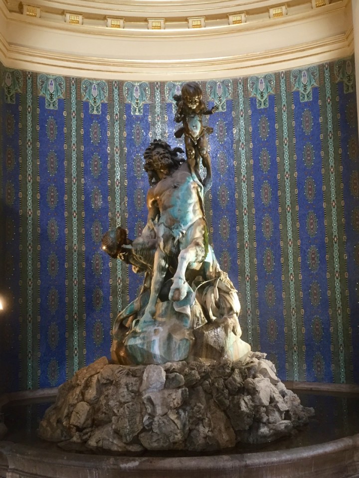 Statue of fawn inside Spa - not sure what he's doing with that kid