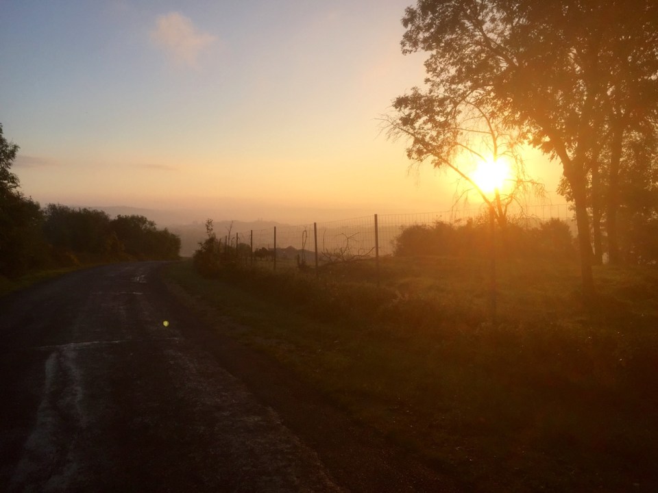 Sunrise as I cycle over the hills from Verdun