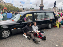 Hearse blocking road in Trafalgar Square