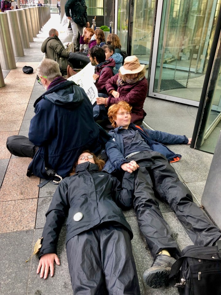 Rebels glued on outside Barclays Office in Canary Wharf