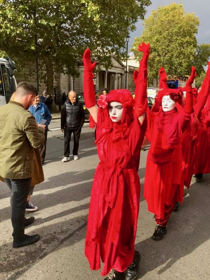 Red Brigade raised their hands